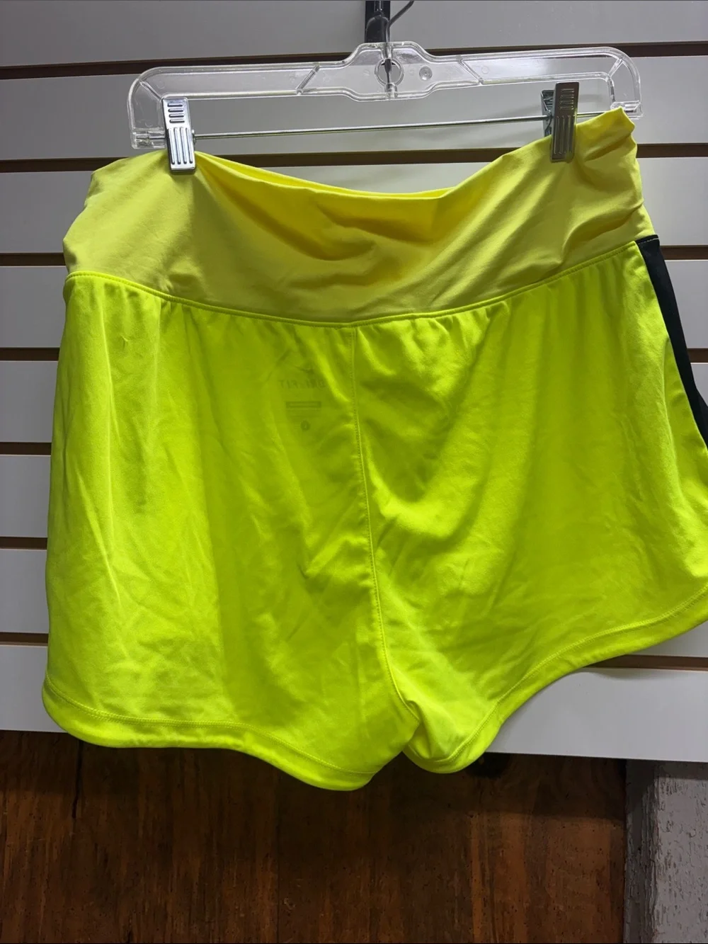 Nike Women's Neon Yellow Athletic Shorts with Black Side Panels